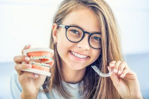 orthodontic treatments" braces and clear aligners